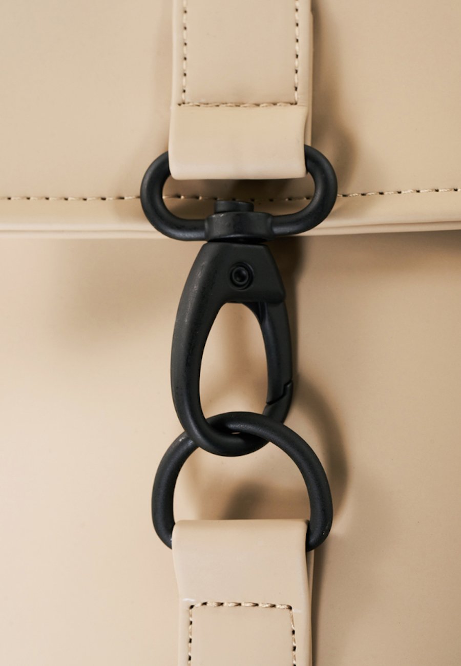 Daypack MSN BAG from RAINS MINI in beige Your waterproof companion in